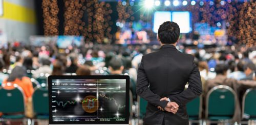 Businessman giving the knowledge with showing Cryptocurrency tra